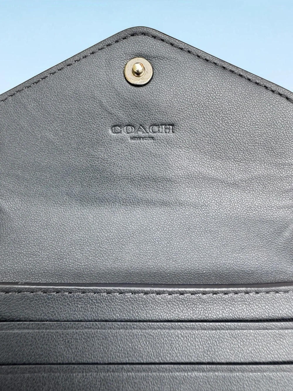 COACH Wyn Small Wallet in Dove Grey and Sky Blue Multi Colorblock.